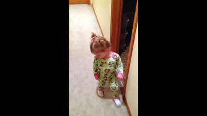 This toddler just can t seem to escape her own tiny shadow