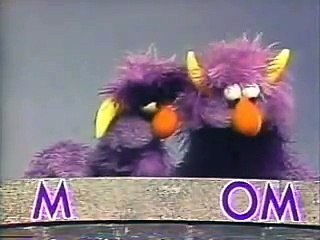 Classic Sesame Street: The 2-headed Monster spells MOM