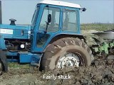 Tractor Ford TW-25 stuck in mud, ploughing & discing