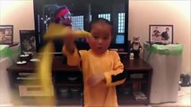 Young Kid mimics Bruce Lee's Nunchaku scene