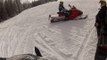 Topping out Gravel Mt. on snowmobile Grand Lake Colorado.  Small Avalanche first run.