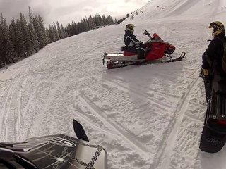 Topping out Gravel Mt. on snowmobile Grand Lake Colorado.  Small Avalanche first run.