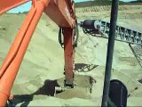Hitachi Zaxis 350 LC-3 moving sand in a gravel pit