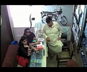 2 Women have stolen mobile from mobile shop see cctv footage