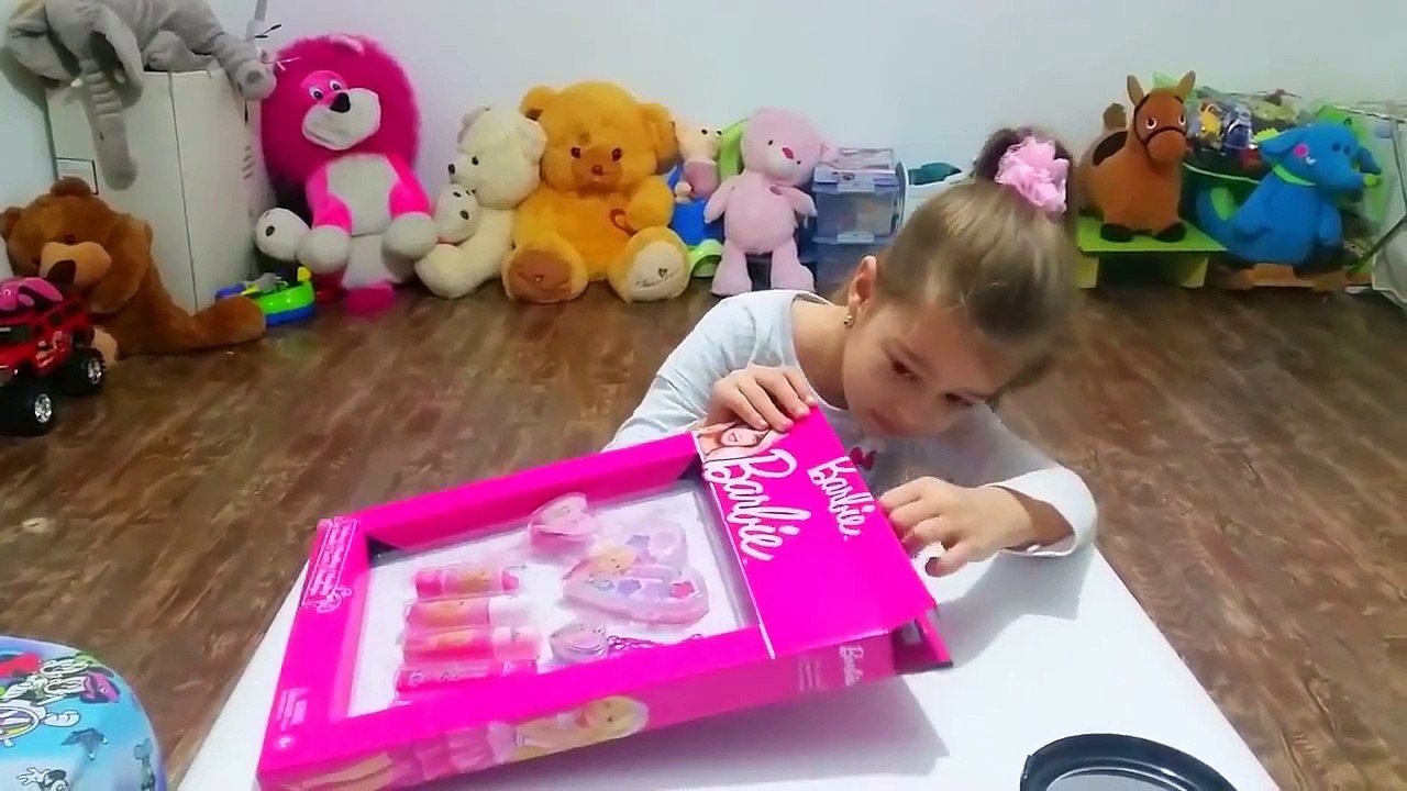 Barbie makeup set tutorial for children . Kit for girls. Cute kids video