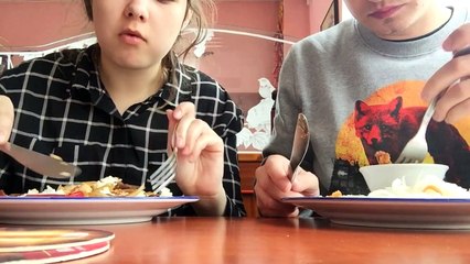 weird couple eating chinese food BACKWARDS