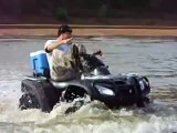 MUST SEE. Honda Rincon 680 doing lots of wheelies and playing in the river.