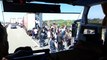 Des migrants prennent d'assaut un camion pour passer en Angleterre à Calais