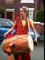 Pakistani Girl is drum beating