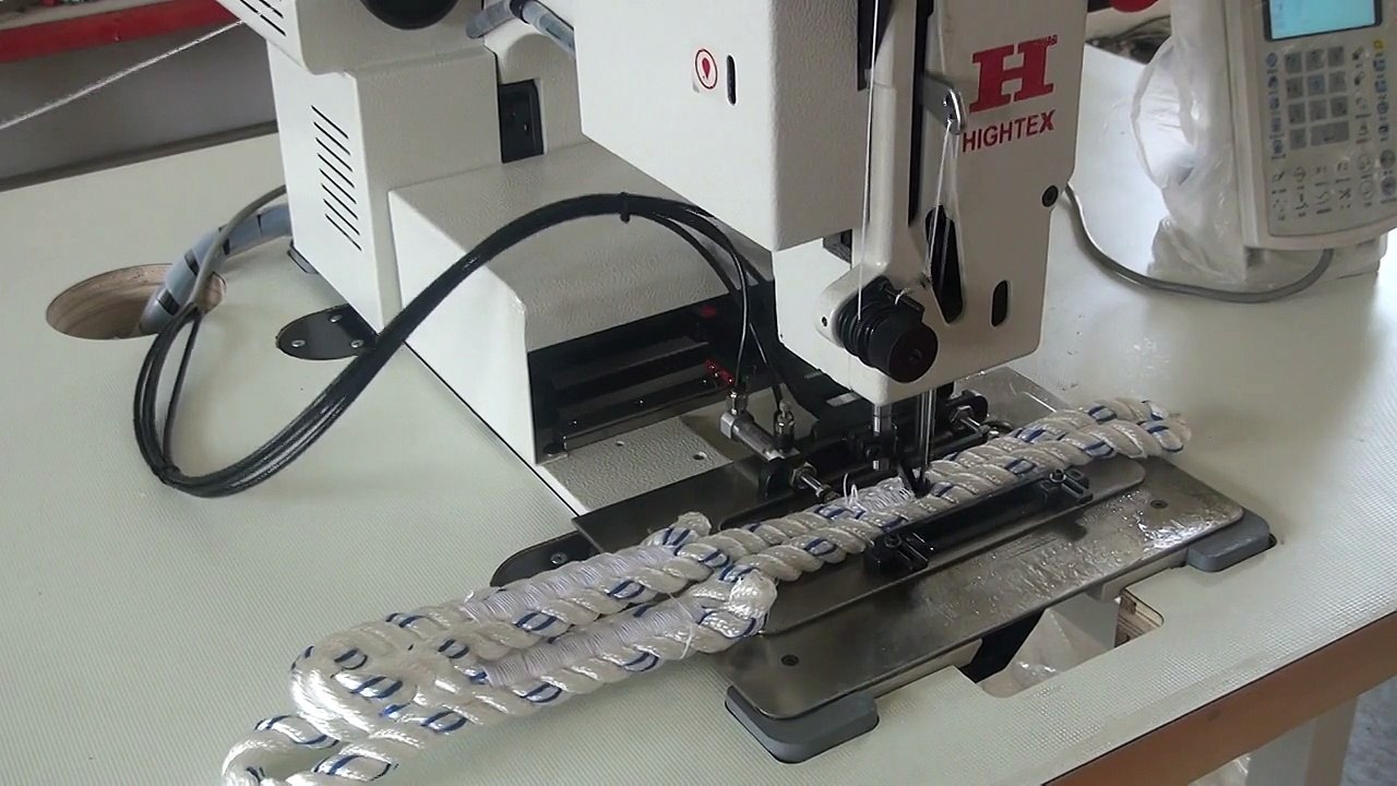Máquina de coser computarizada para cuerdas y cables
