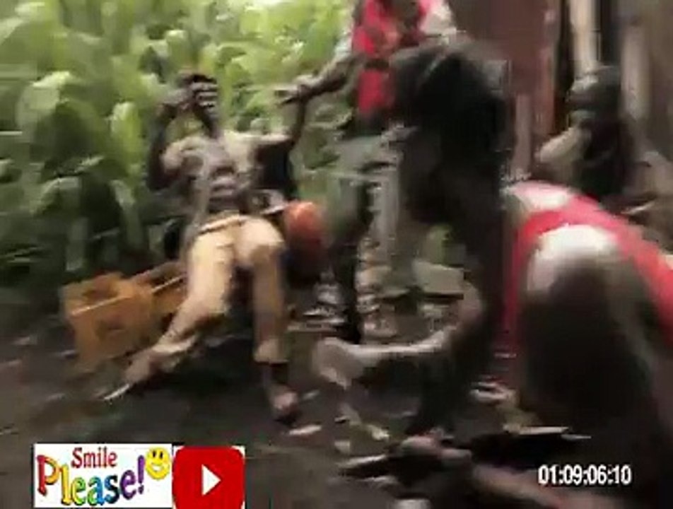 Ape hands a AK47 with African soldiers