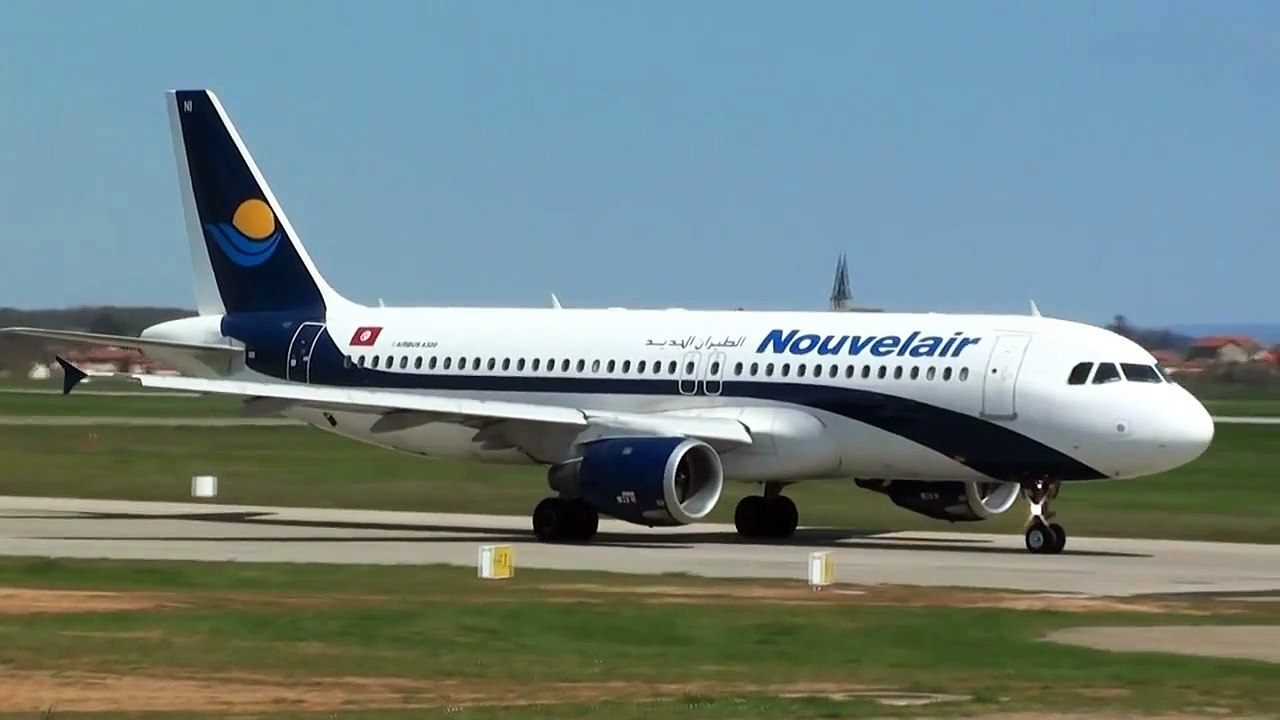 A320 Nouvelair Tunisie (TS-INI) line up and take off at Lyon St Exupéry ATC inc.