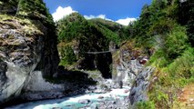 Time-lapse of the river Dudh Koshi and the Larja Dobhan suspension bridge..