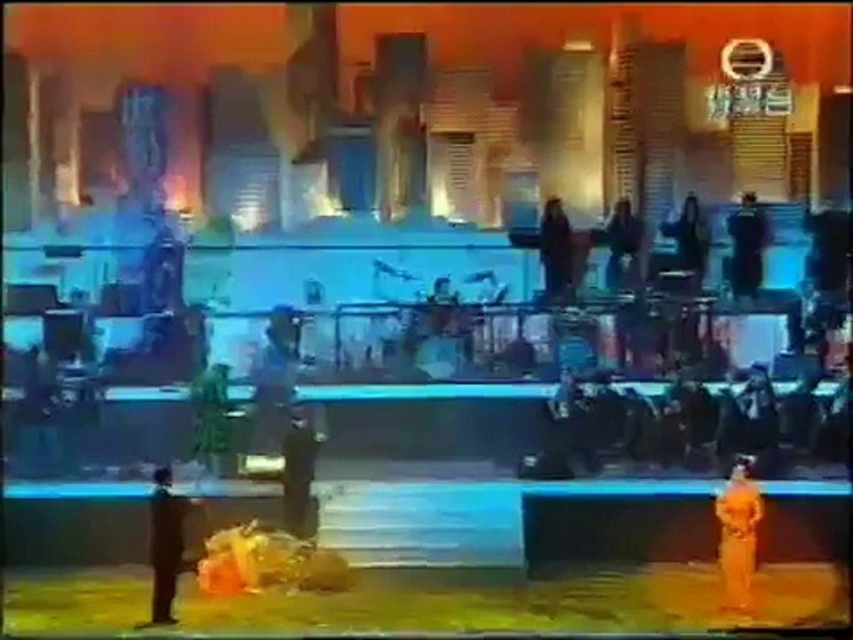 甄妮、羅文 - 世間始終你好 (顧家煇金鑽群星賀回歸) (1997) (電視MV)
