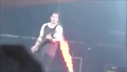 Singer gets caught on fire because of pyrotechnic concert effect!