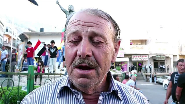Pro-Bashar al-Assad protesters gather in Golan Heights