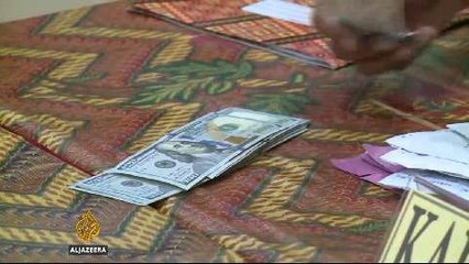 Banknotes in alleged Australia diplomatic spat emerge