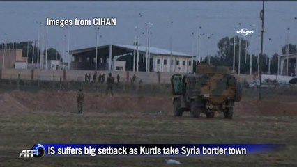 IS suffers big setback as Kurds take Syria border town