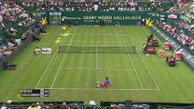 Roger Federer slips but still continue the point vs Kohlschreiber
