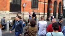 Tourists Watch a Random Performance in Dublin's Temple Bar, Ireland