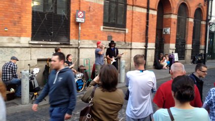 Tourists Watch a Random Performance in Dublin's Temple Bar, Ireland