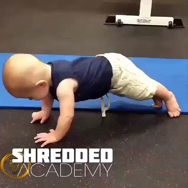 cut baby trying push up