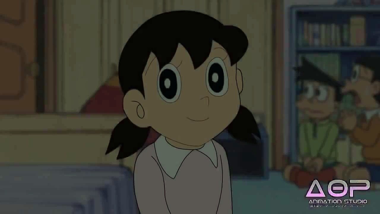 Shizuka bailando en frente de Doraemon y Nobita