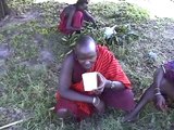 Tanzanian village life,(The massai skinning a goat )