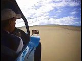 Driving a dune buggy on the sand dunes in Australia