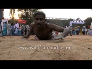 Devotee crawling towards Yamuna ghat during Chhath Puja