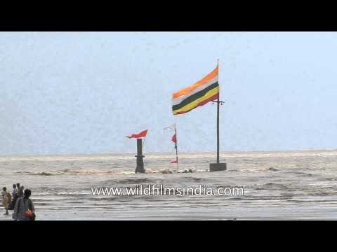 Devotees walking back from the beach after idol immersion in Alang, Gujarat