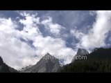 Clouds passing over Himalayan mountains en route Lamkhaga Pass in Himachal Pradesh