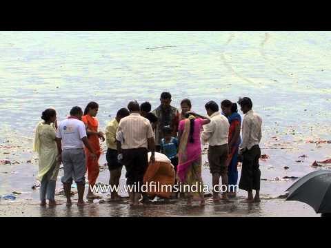 Indians perform rituals at Alang beach in Gujarat