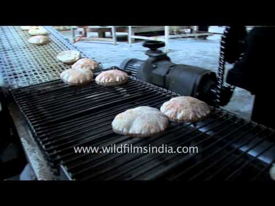 Chapatti-making machine at Golden temple, India