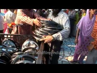 Devotees head towards langar hall at Golden Temple, Punjab
