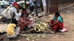 Women sell bhutta or roasted corn-on-the-cob in Kathmandu