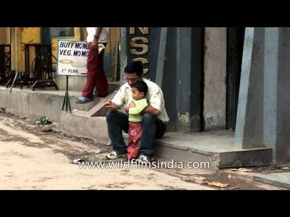 Nepali women selling lychees (litchi) at a local market in Kathmandu city
