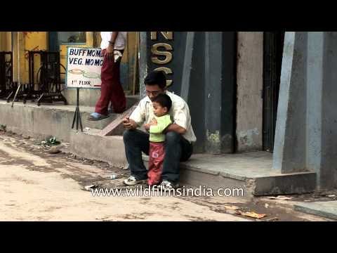 Nepali women selling lychees (litchi) at a local market in Kathmandu city