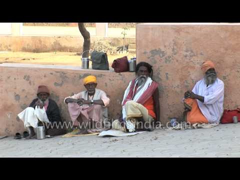 Sadhus beg outside Shri Koteshwar Mahadev Temple in Kutch, Gujarat
