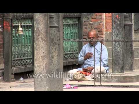Devotees offer prayers at the Pashupatinath temple - Kathmandu