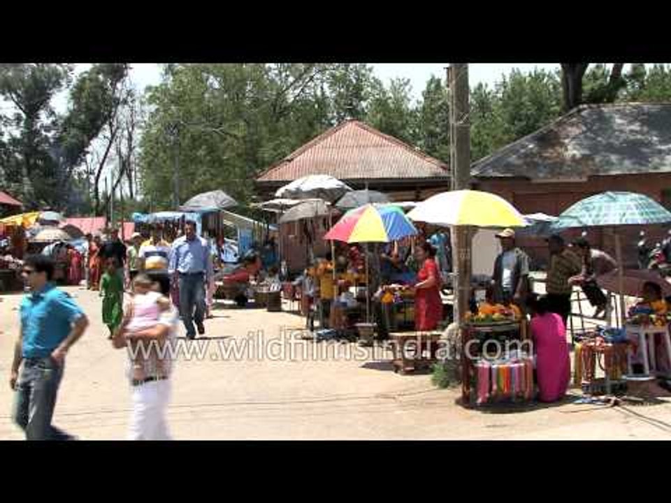 Street vendors selling puja items outside a temple in Kathmandu