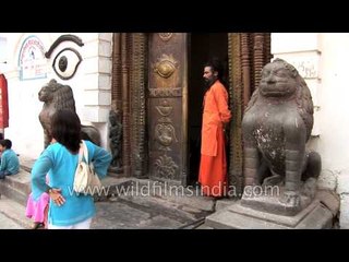 Sadhus sit inside the Pashupatinath Temple in Nepal