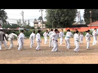 Young players practice Taekwondo in Nepal