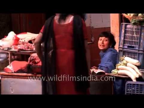 Nepali woman sells pork meat : Kathmandu, Nepal
