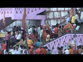 Kavarias carrying 'Ganga Jal' in small containers - Kavad Mela, Haridwar