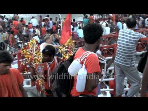 Kavarias throng Haridwar for the annual religious 'Kavad Mela'