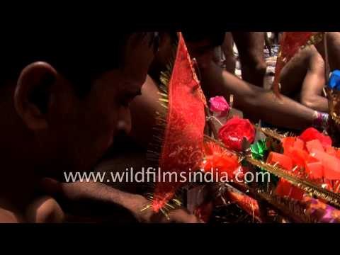 Kanwarias carry holy water from the river Ganges - Haridwar