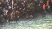 Hindu devotees gather to bathe in river Ganges during the Kumbh Mela - Haridwar