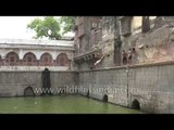 Young Lads Showing Their Diving Skills At Ancient Step-Well - Delhi | India