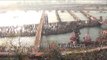 Hindu crowds fill plastic jerrycans with Ganga jal during Kumbh Mela